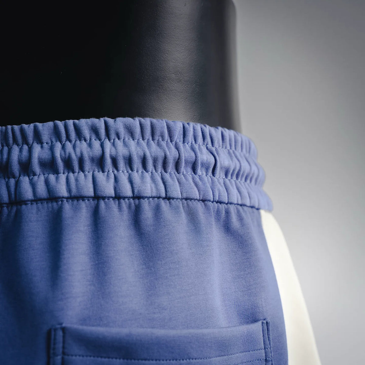 Dior blue track shorts waistband with gathered elastic detail