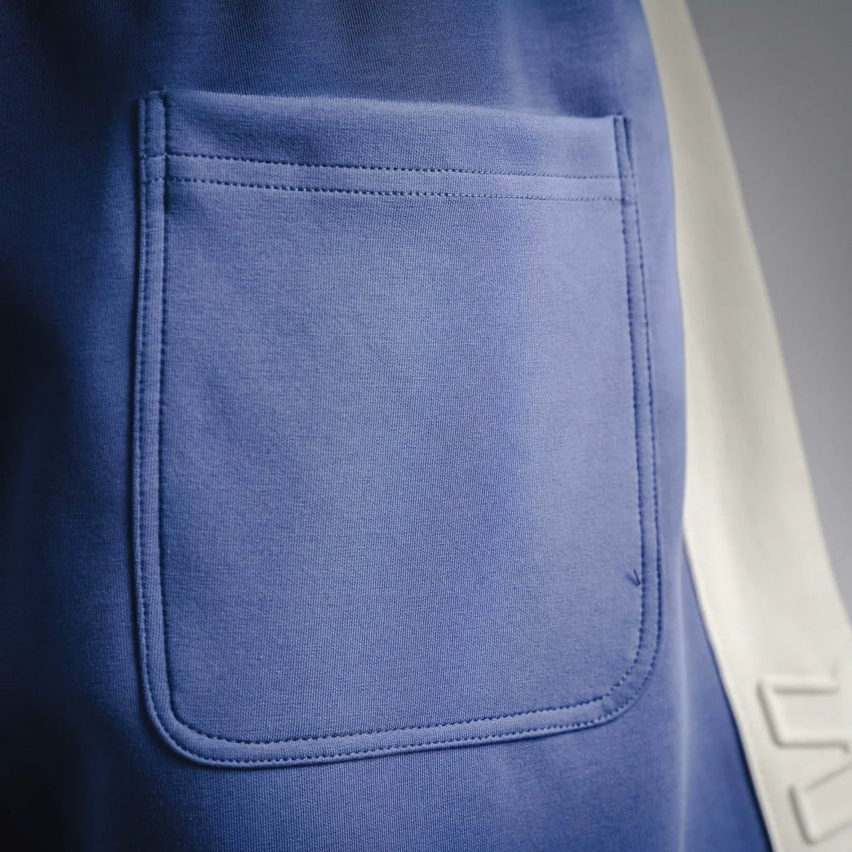 Dior blue track shorts front pocket with stitched border