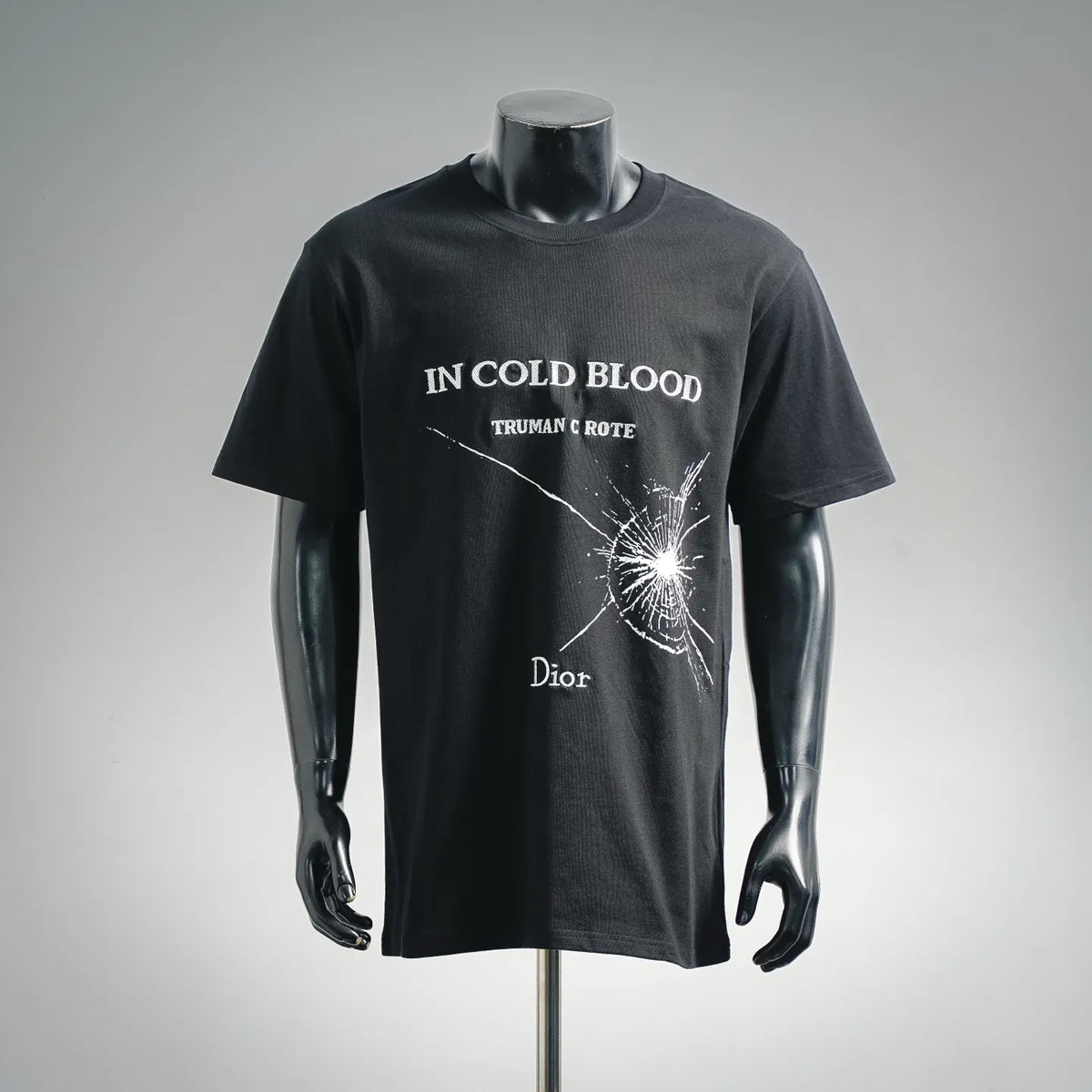 Black crewneck T-shirt with “IN COLD BLOOD” graphic and Dior logo on front