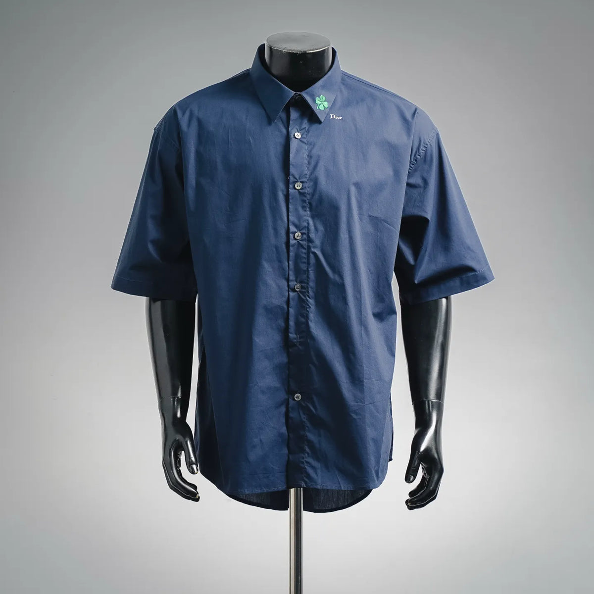 Dior short-sleeve button-up shirt, dark blue with button front and green clover logo