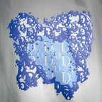 Blue abstract graphic print on white T-shirt front