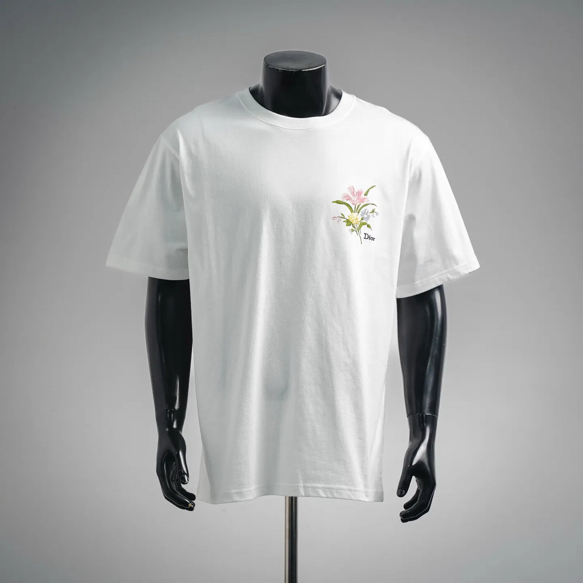 White short-sleeve T-shirt with colorful floral chest embroidery and Dior logo