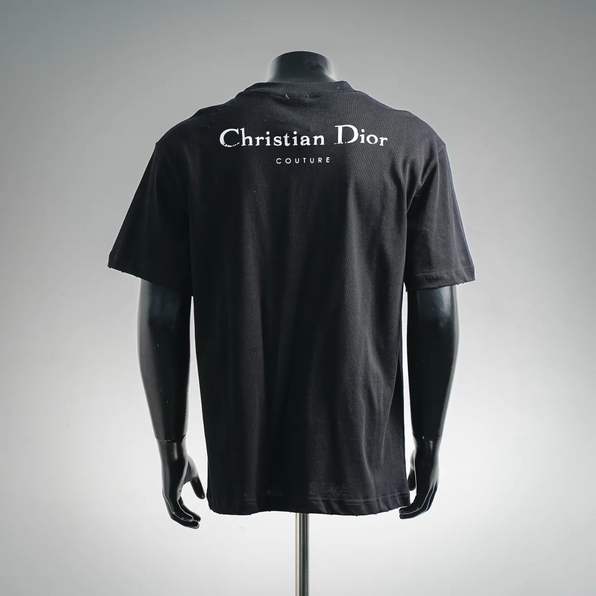 Black Christian Dior short-sleeve T-shirt, back view with large logo text