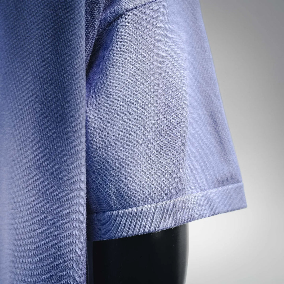 Light purple T-shirt lower side and hem with ribbed band trim