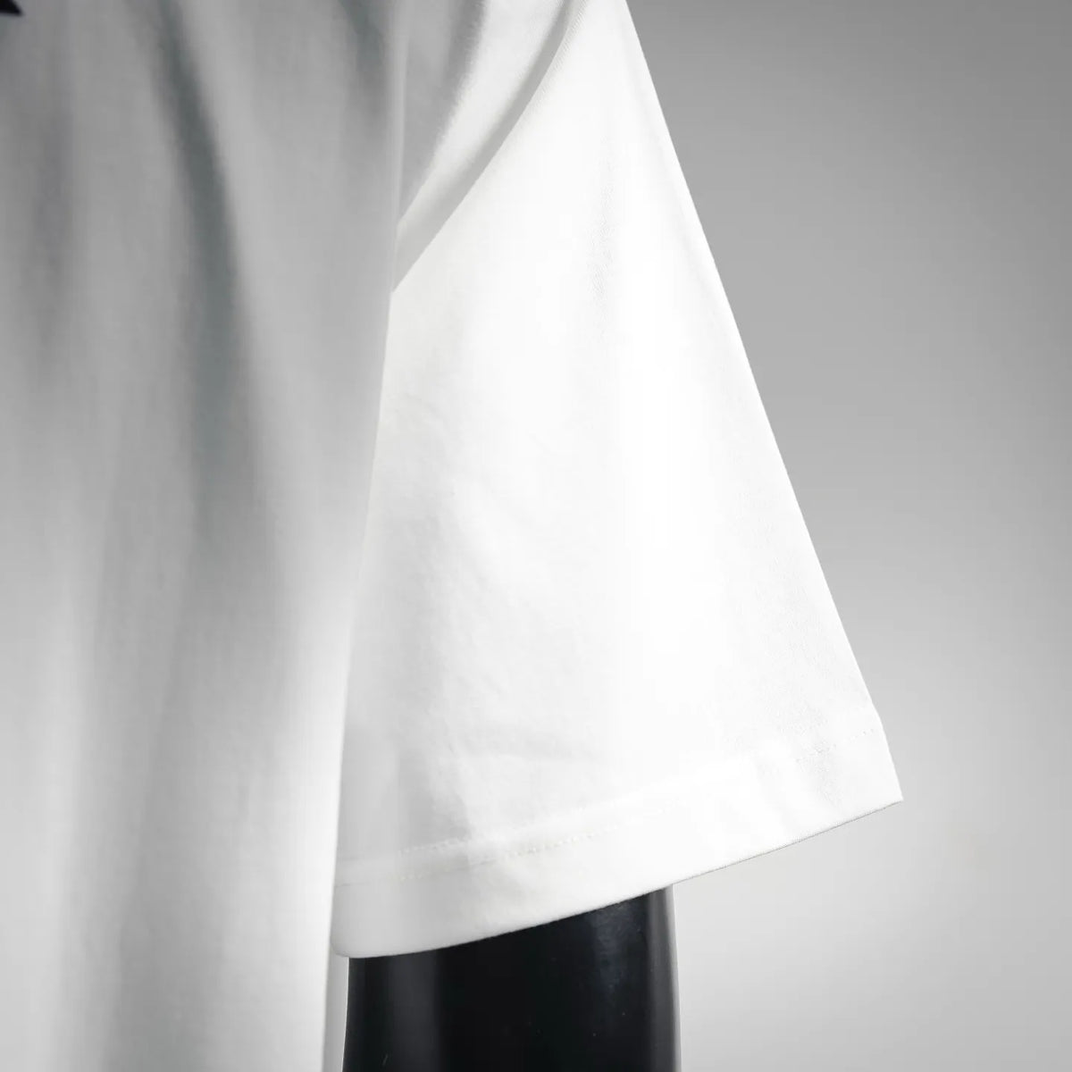 White T-shirt side drape detail with short sleeve hem