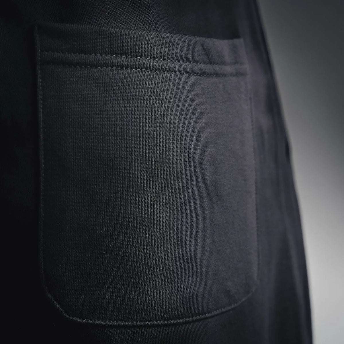Black shorts with front patch pocket detail