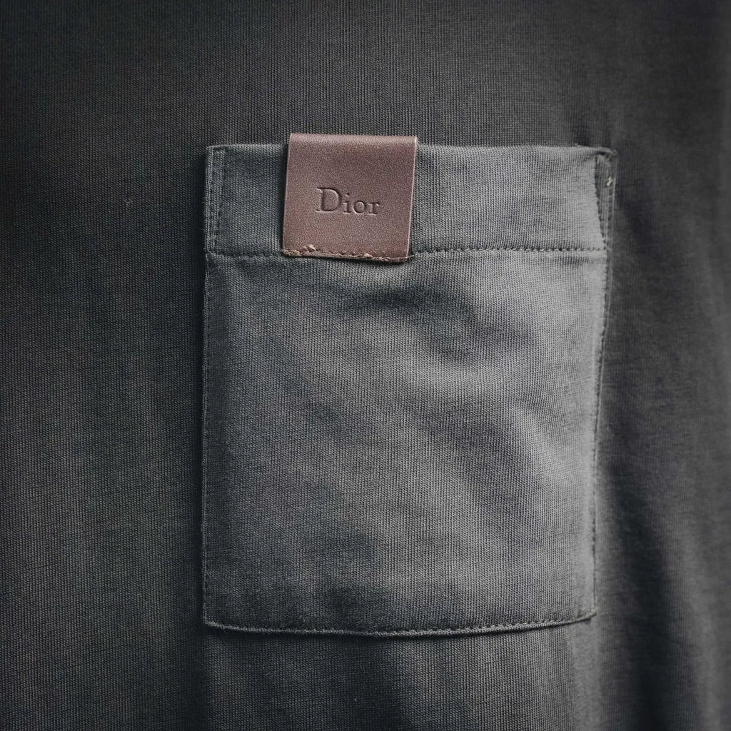 Dior dark gray chest pocket with Dior brand patch label