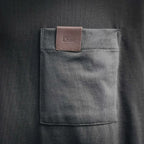 Dior dark gray chest pocket with Dior brand patch label