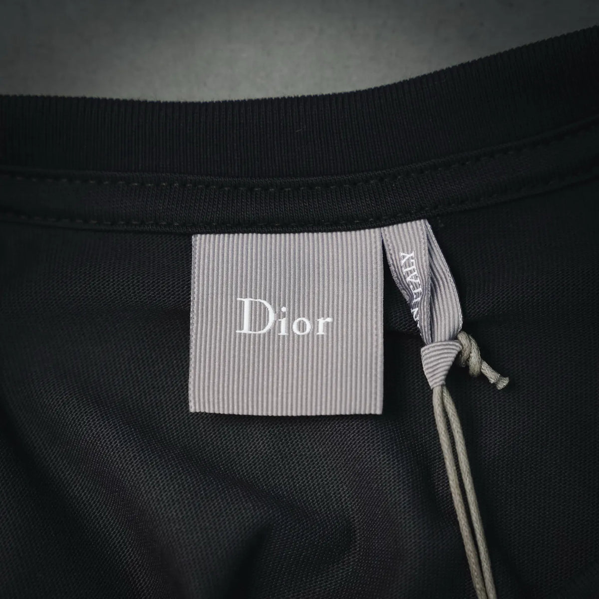 Dior dark gray T-shirt collar label and drawstring detail