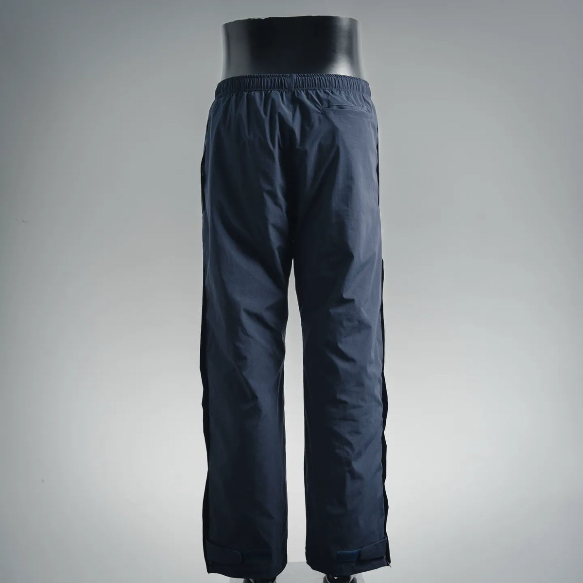 Navy track pants, relaxed fit with elastic waistband and wide straight legs