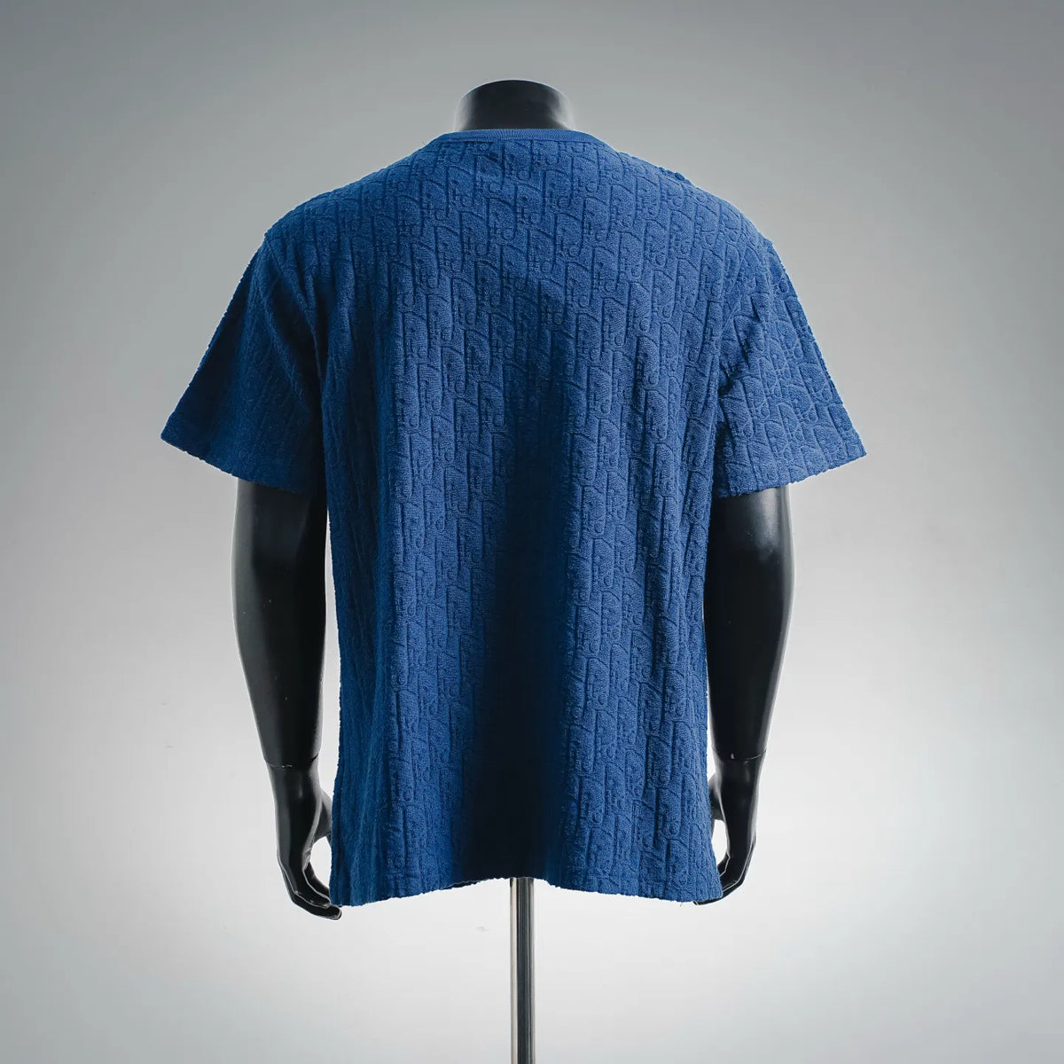 Dior blue crewneck short-sleeve T-shirt, back view with textured monogram pattern