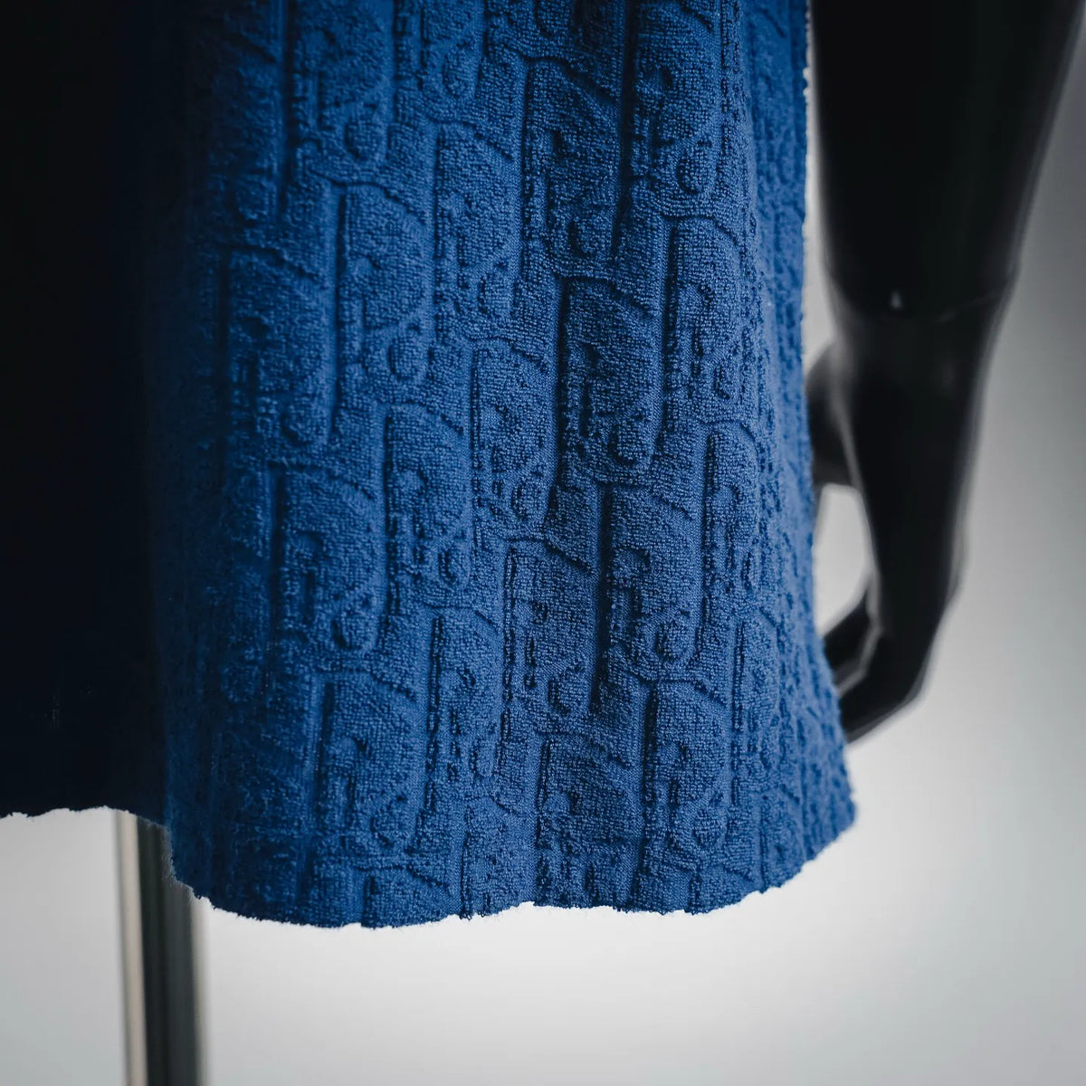 Dior blue textured knit T-shirt fabric with raised monogram pattern