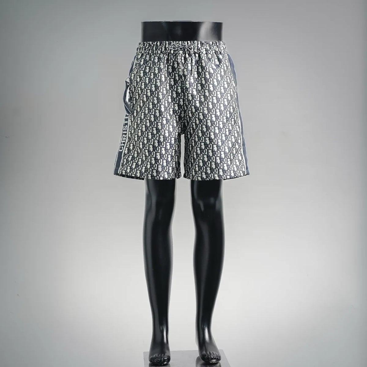 Dior-logo print elastic-waist shorts, black and light blue knit pattern