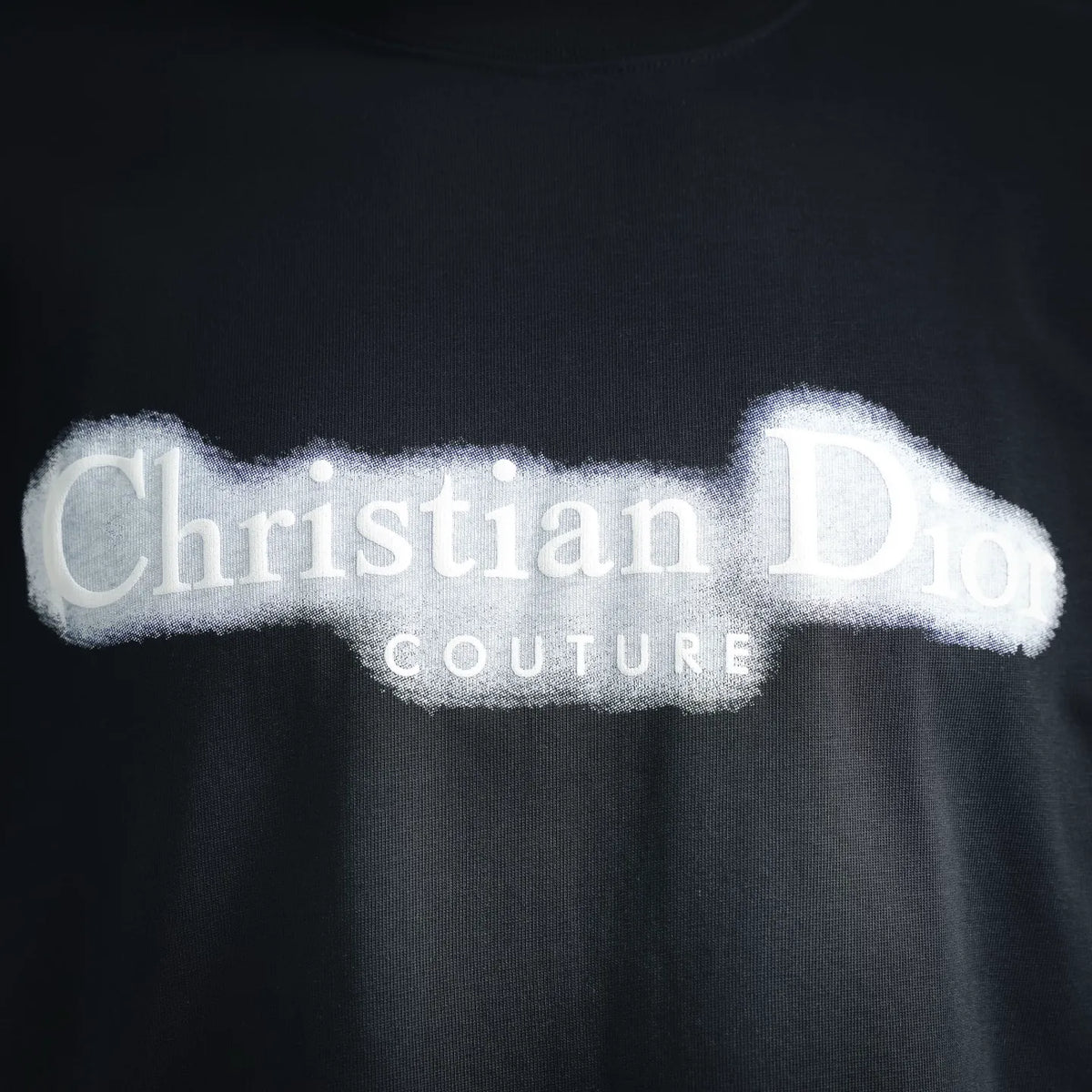 Black Dior T-shirt with large white Christian Dior Couture logo text