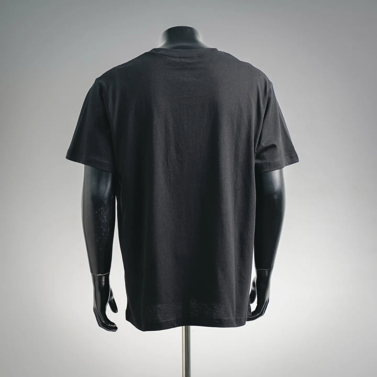 Black Dior short-sleeve T-shirt on mannequin, back view