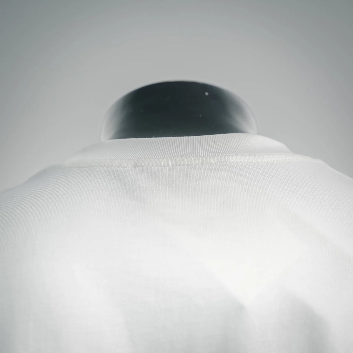 Dior white short-sleeve T-shirt with high neckline and back seam detail