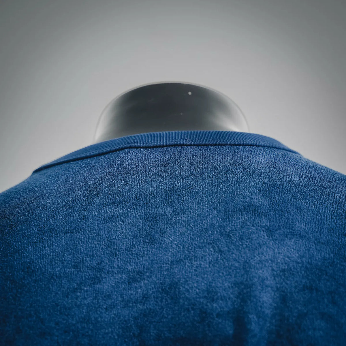Blue crewneck T-shirt collar and back neckline detail