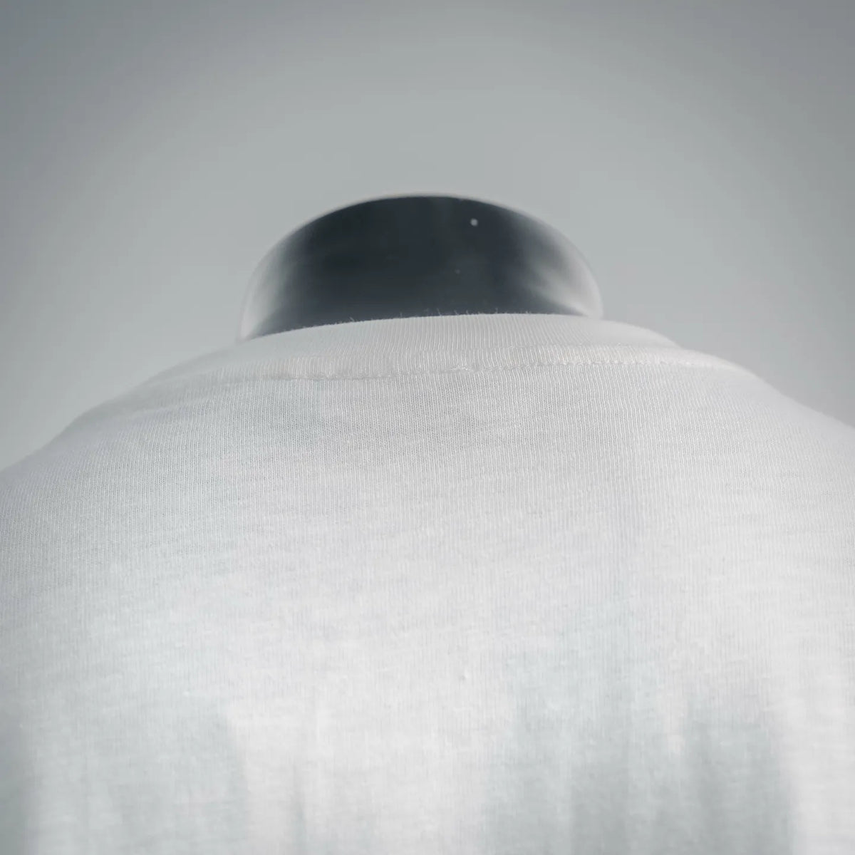 White short-sleeve T-shirt with crew neck collar.