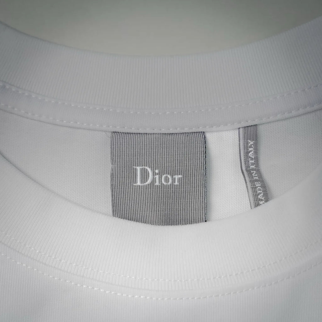 White T-shirt neck label with Dior branding on inner collar