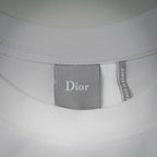 White T-shirt neck label with Dior branding on inner collar