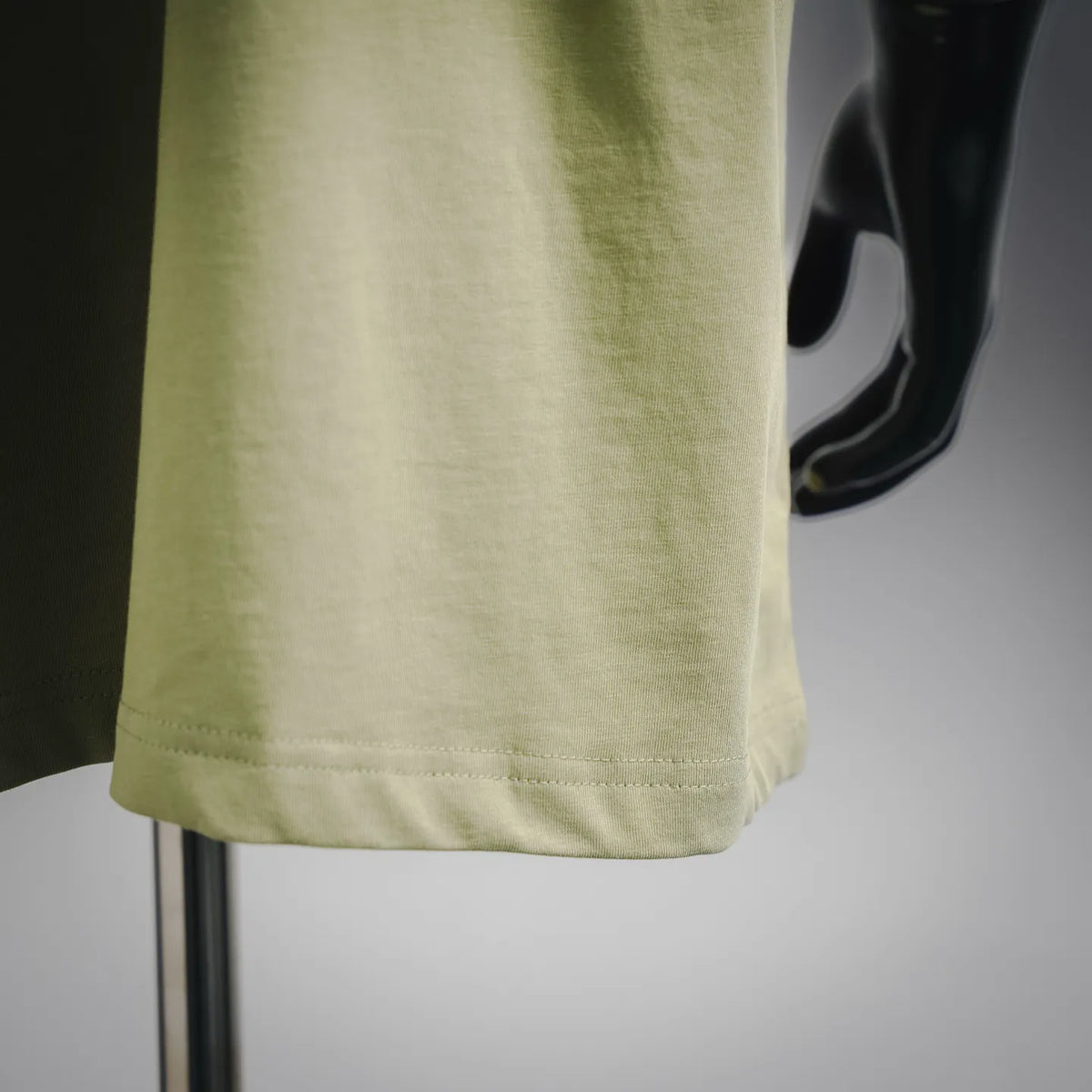 Lime green T-shirt hem with double-stitch edging