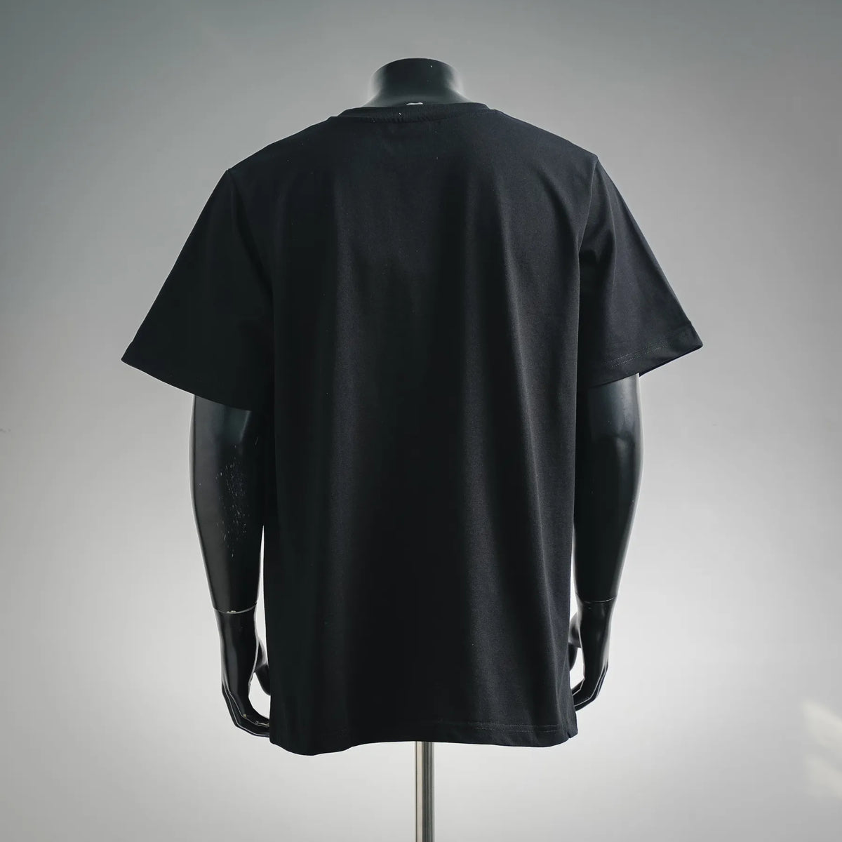 Black short-sleeve T-shirt with plain back on mannequin