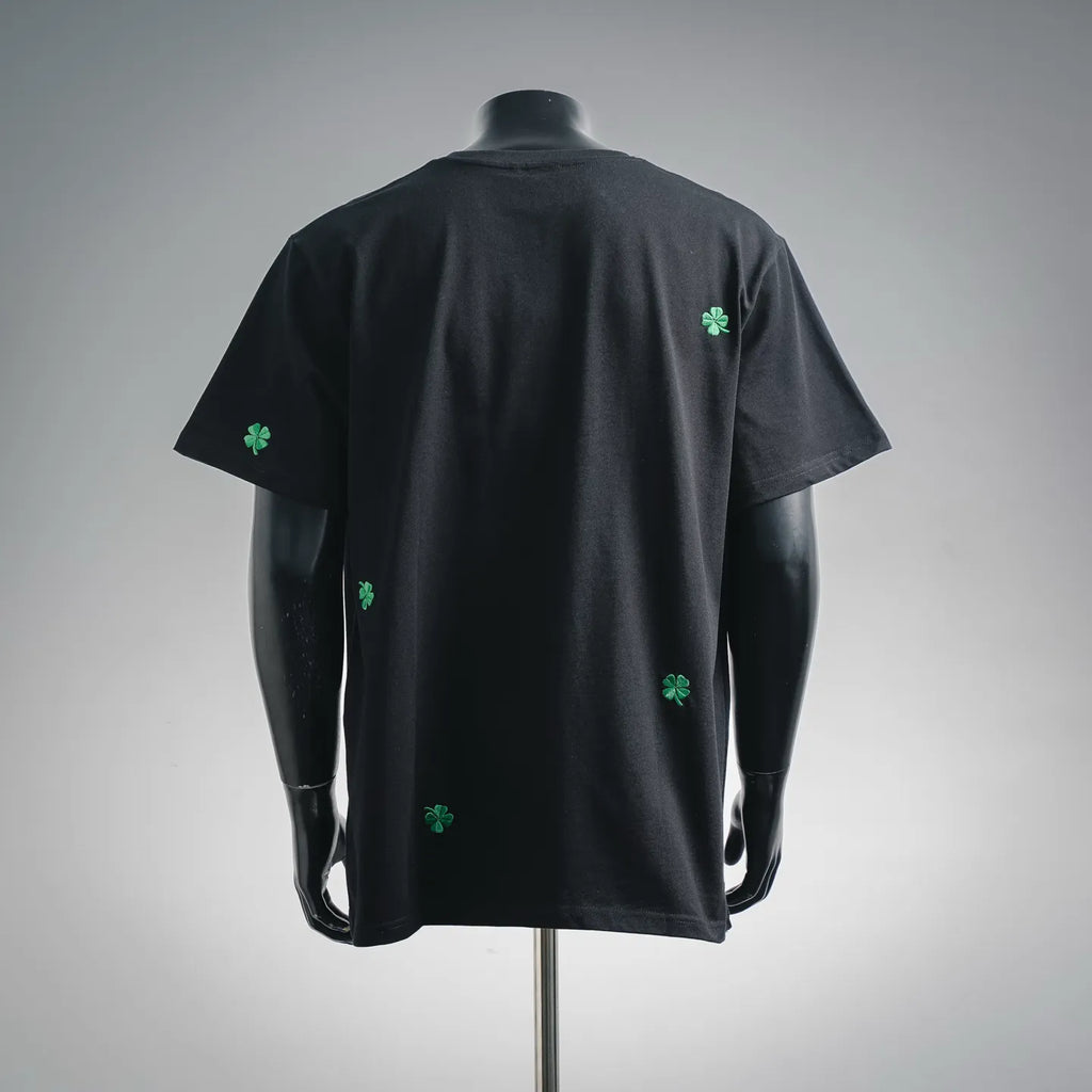 Black Dior short-sleeve T-shirt with green clover embroidery, back view