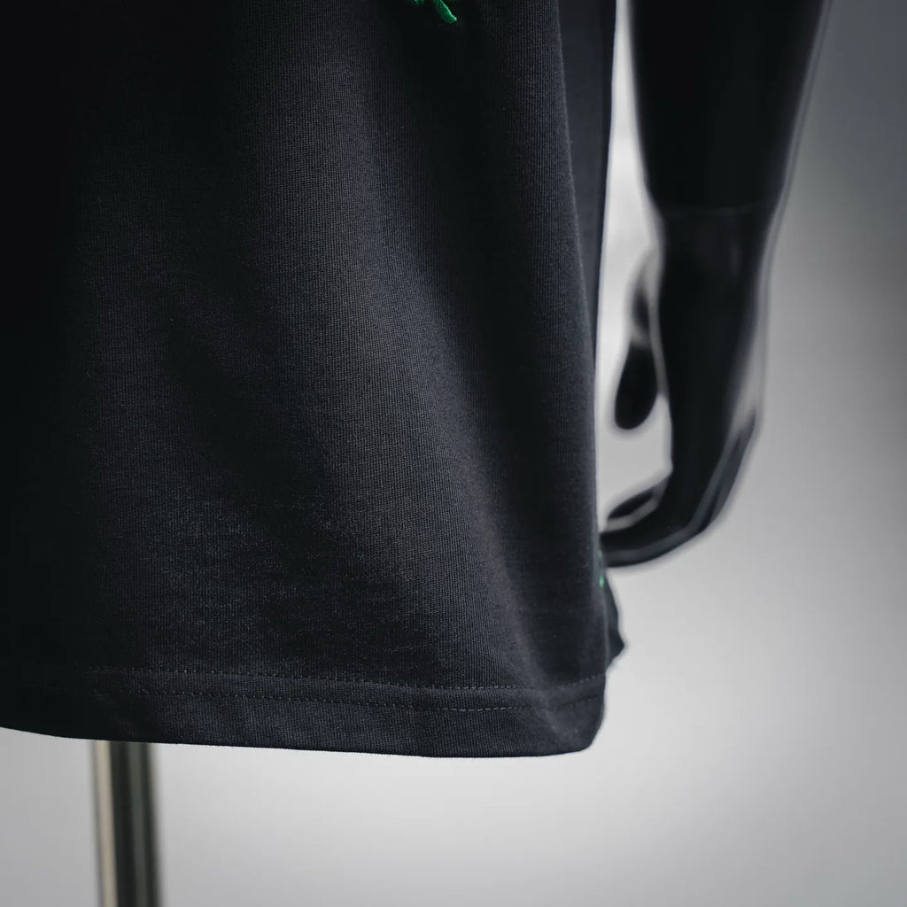 Black T-shirt hem with stitched edge