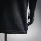 Black T-shirt hem with stitched edge