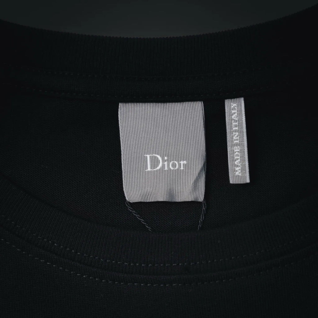 Black Dior T-shirt neckline with Dior size and brand tag