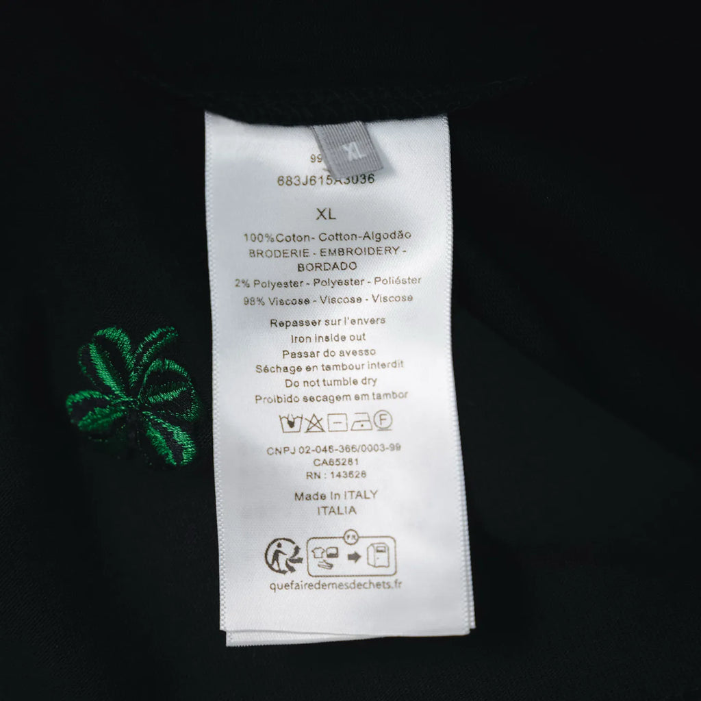 Black Dior T-shirt care label with size XL and fabric blend