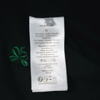 Black Dior T-shirt care label with size XL and fabric blend