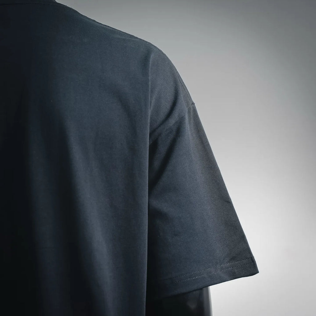Dark short-sleeve T-shirt sleeve detail with smooth fabric