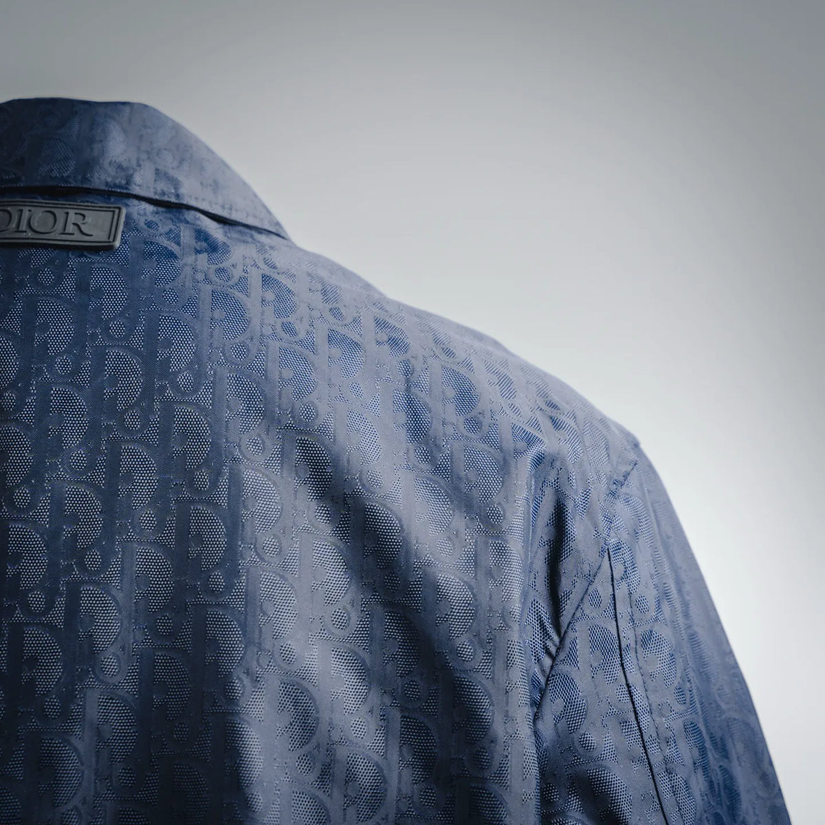 Dior logo-pattern coat shoulder and sleeve in dark blue with side seam