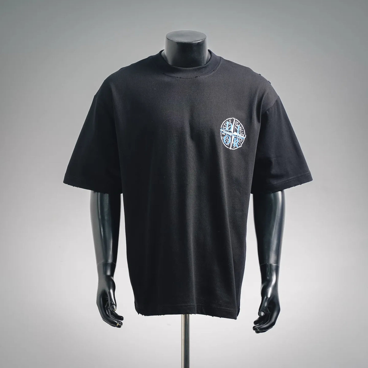 Black crewneck T-shirt with small blue Dior logo on left chest