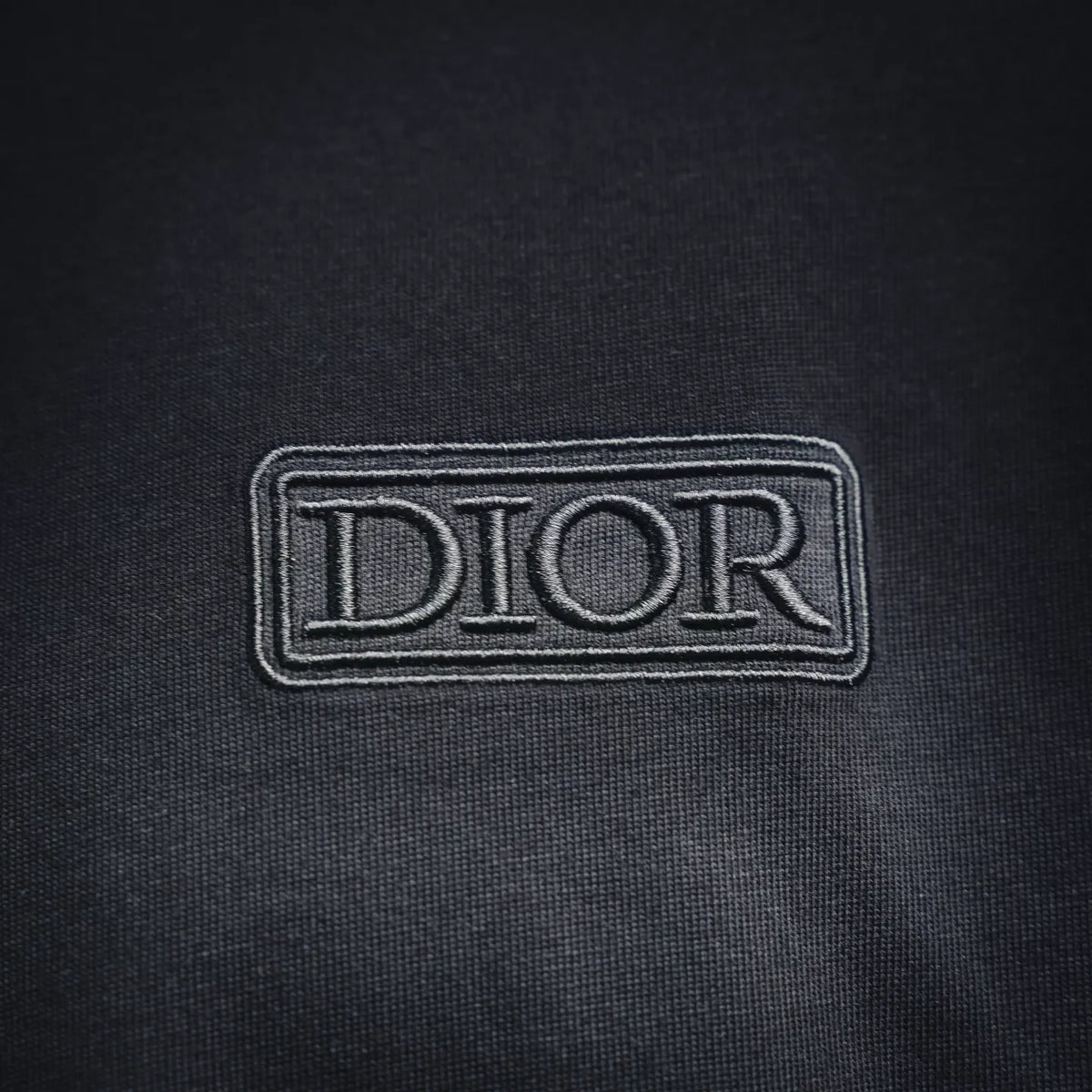 Dior logo patch on chest of dark crewneck short-sleeve T-shirt