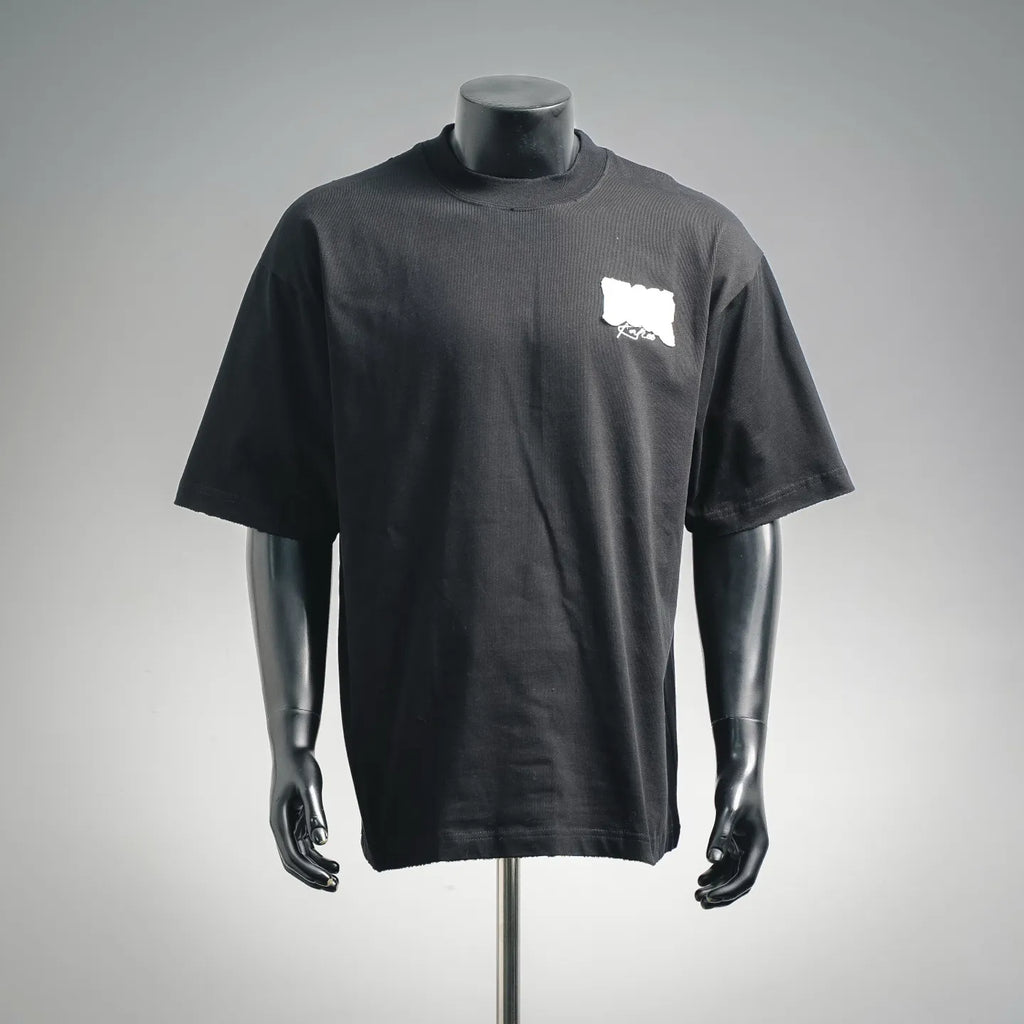 Black short-sleeve T-shirt with white chest Dior logo patch on a mannequin