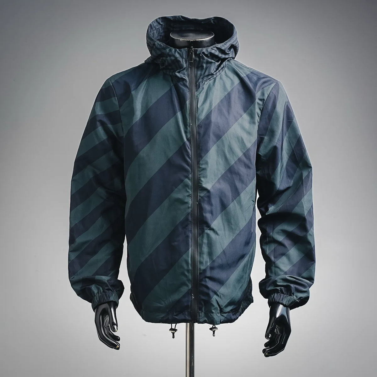 Fendi hooded coat with diagonal patterned panels, full zip front and drawstring hem