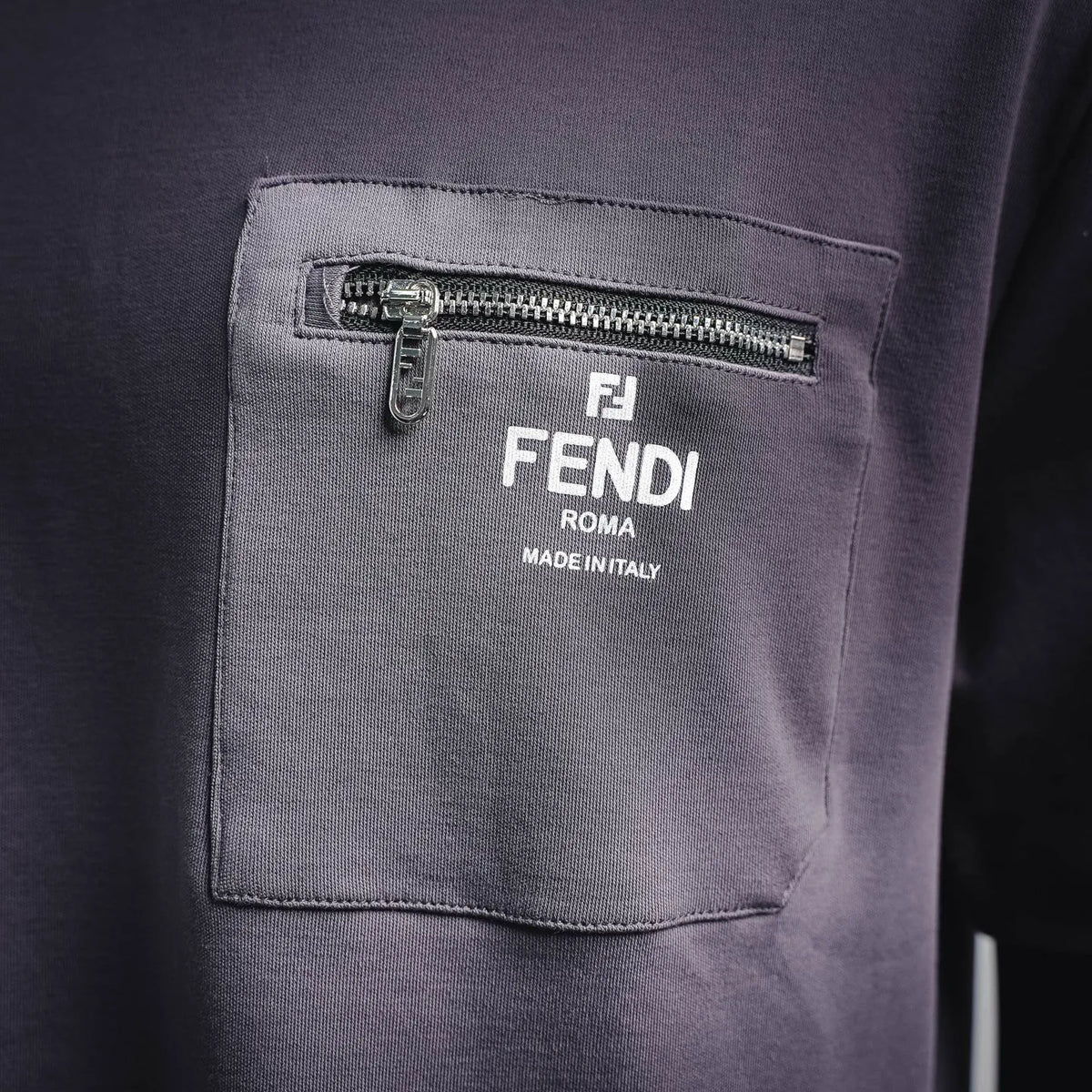 Lavender chest pocket with FENDI zipper logo patch