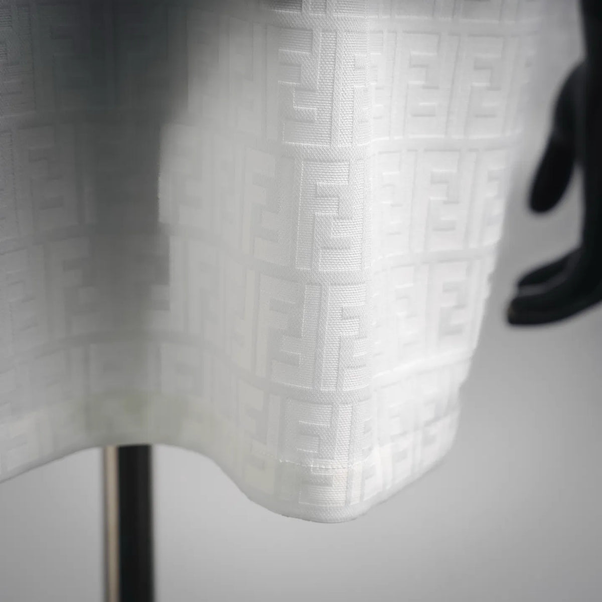 White polo shirt side hem with FF jacquard knit detail