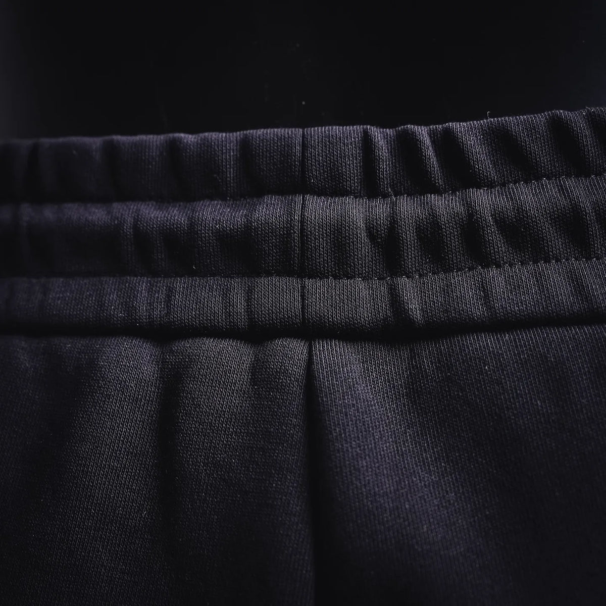 Fendi dark pants waistband and stitched seam detail