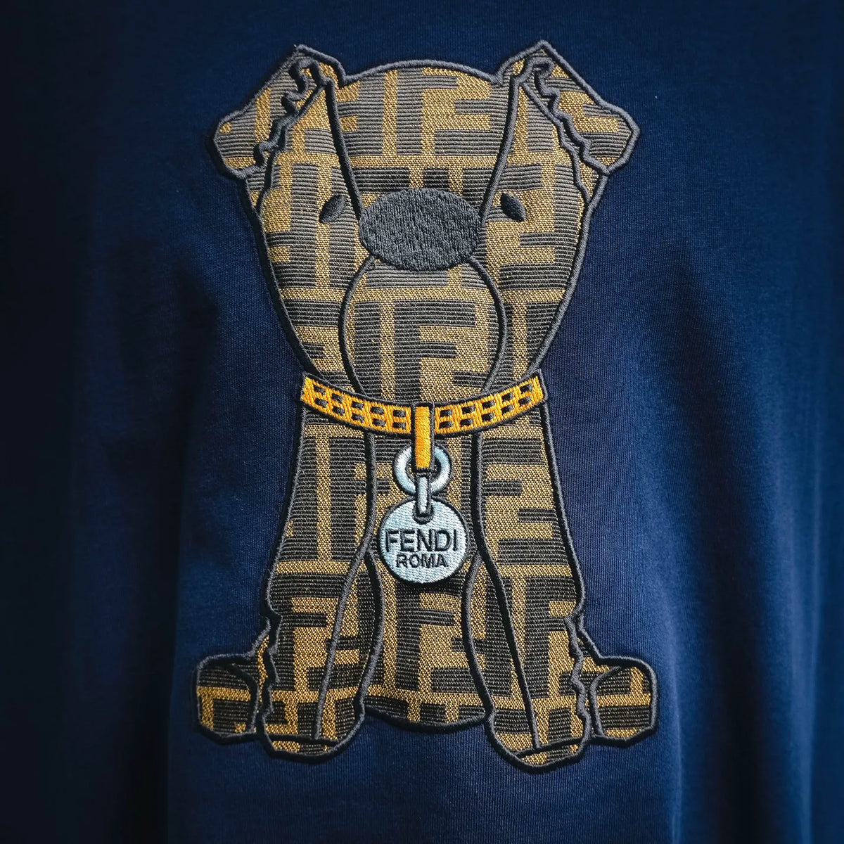 Blue T-shirt with large FENDI Roma bear patch-style graphic