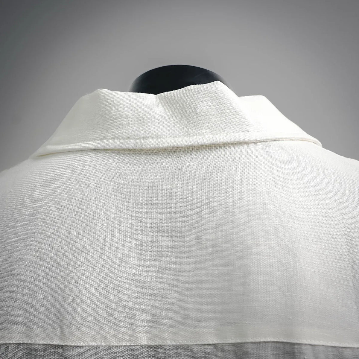 White shirt collar with wide fold, back view