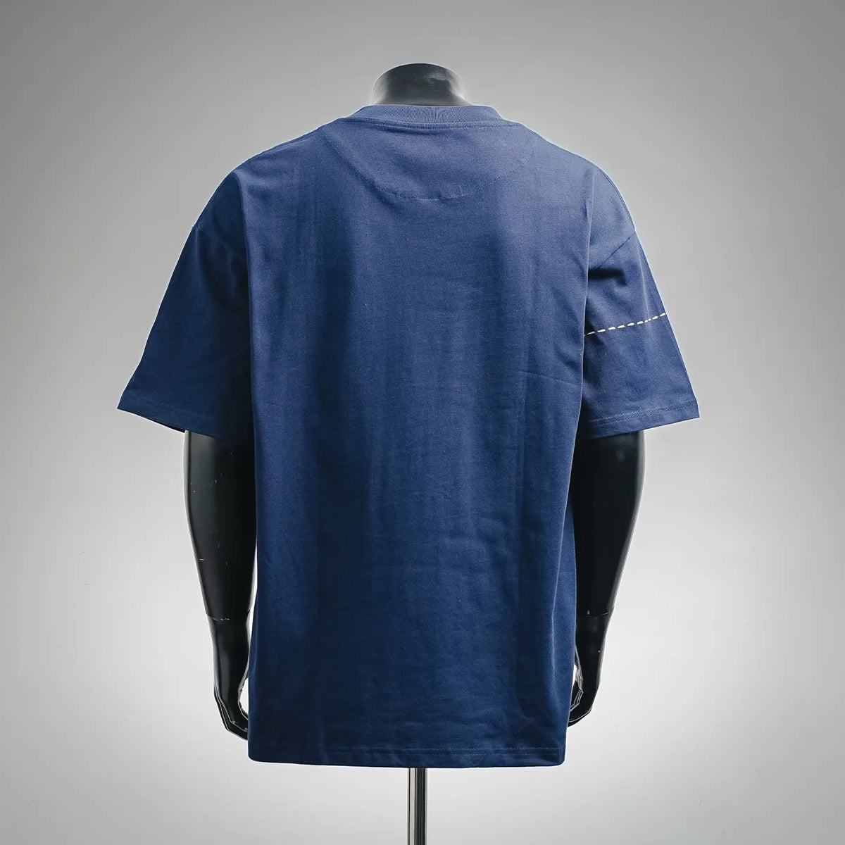 Blue short-sleeve T-shirt back view with white topstitching detail