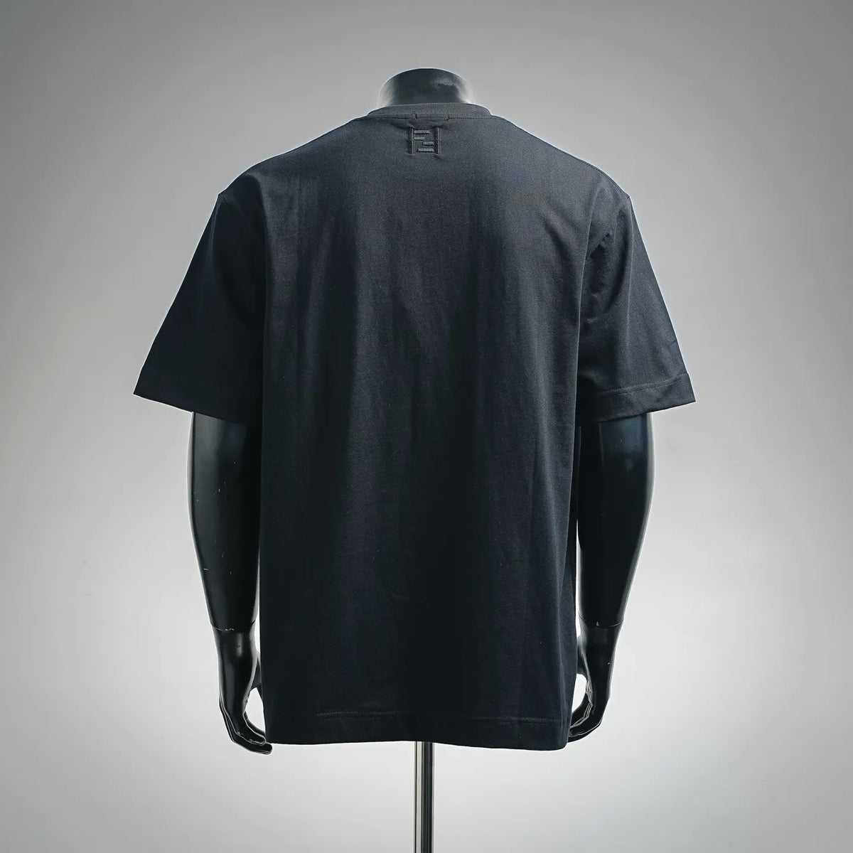 Fendi dark short-sleeve T-shirt back view with small logo at collar