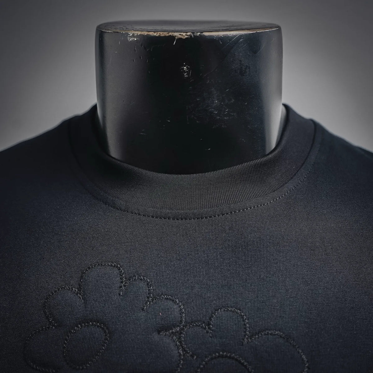 Fendi dark crew neck T-shirt with textured floral embroidery near chest