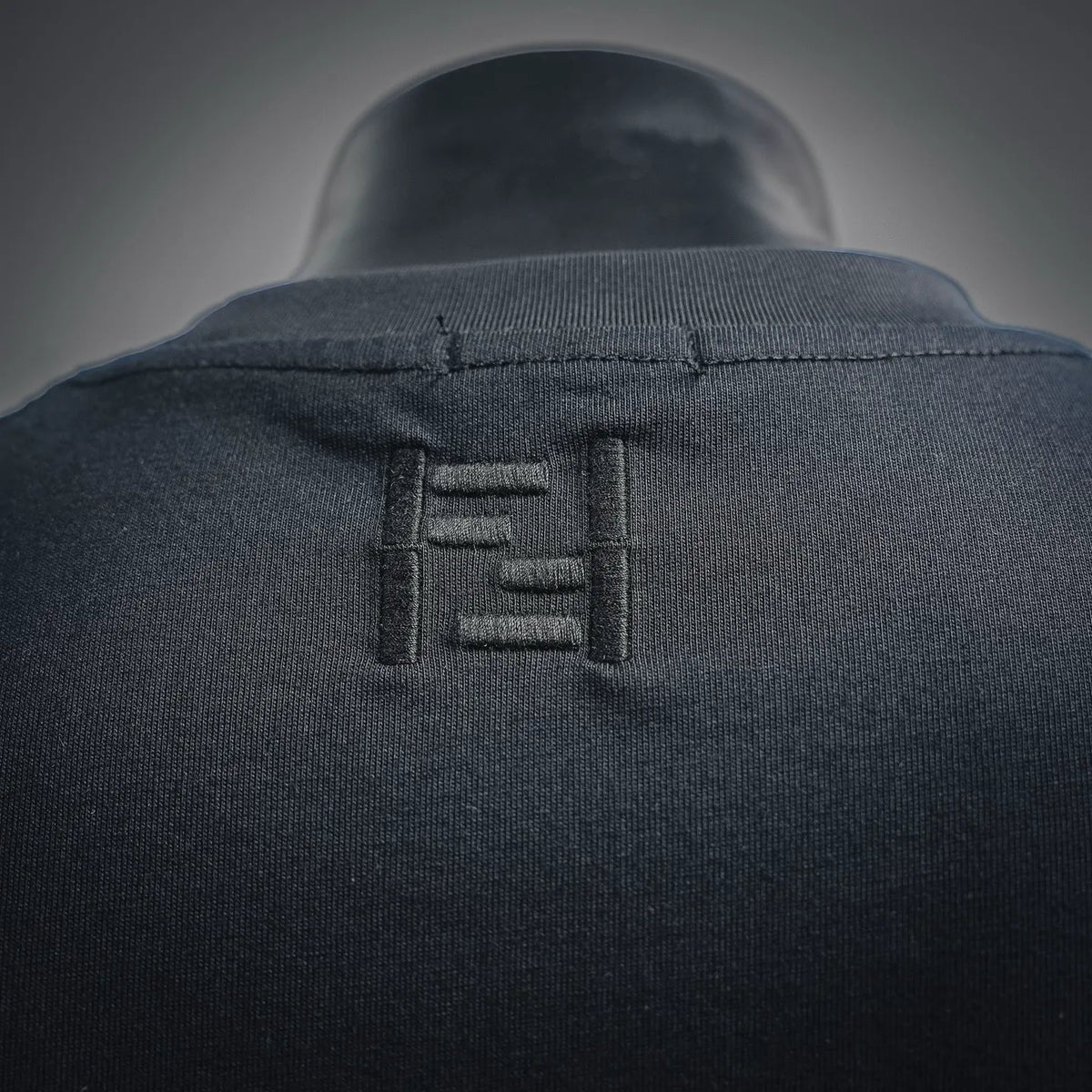 Fendi T-shirt back collar with stitched Fendi logo patch
