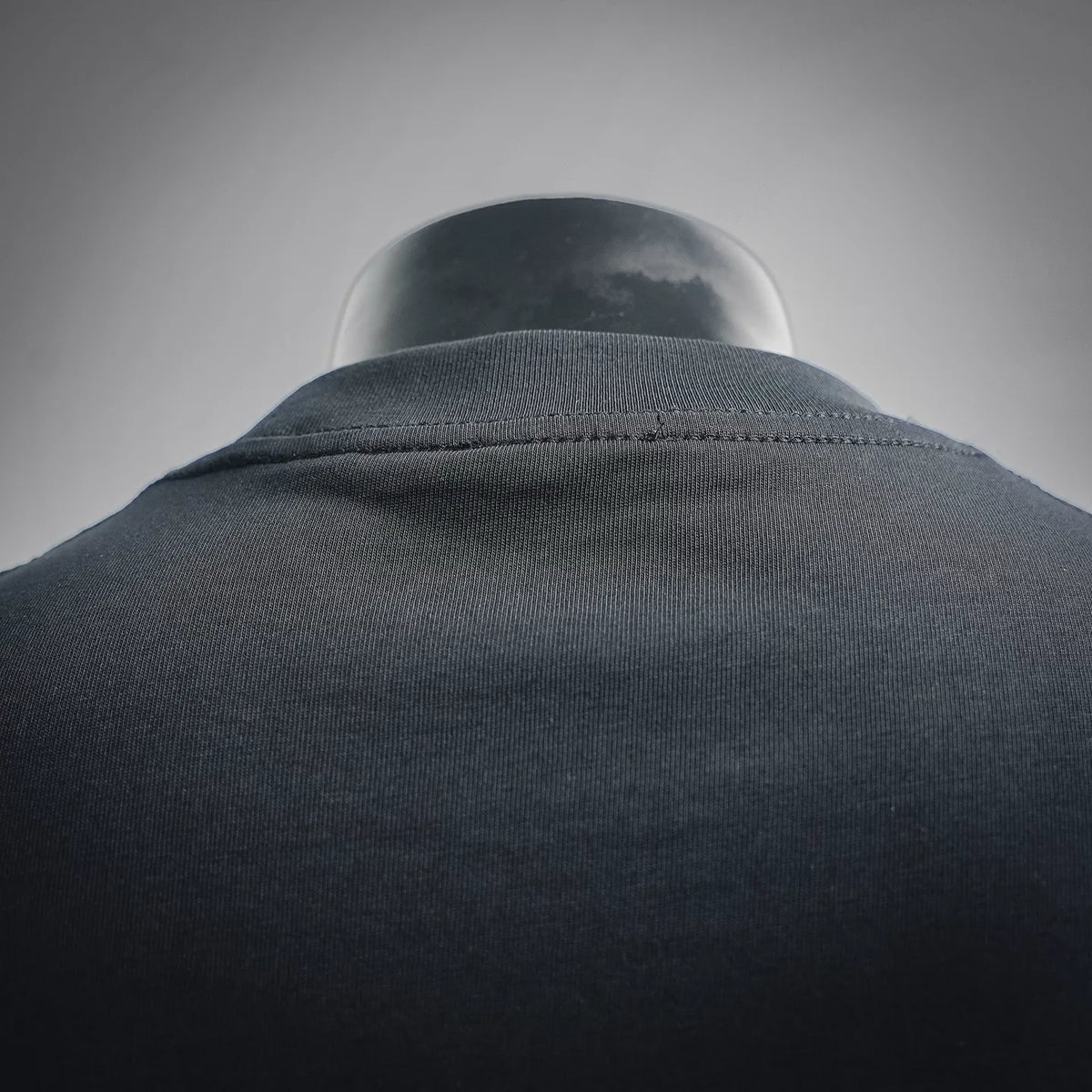 Black short-sleeve T-shirt with ribbed crew collar and stitched back seam