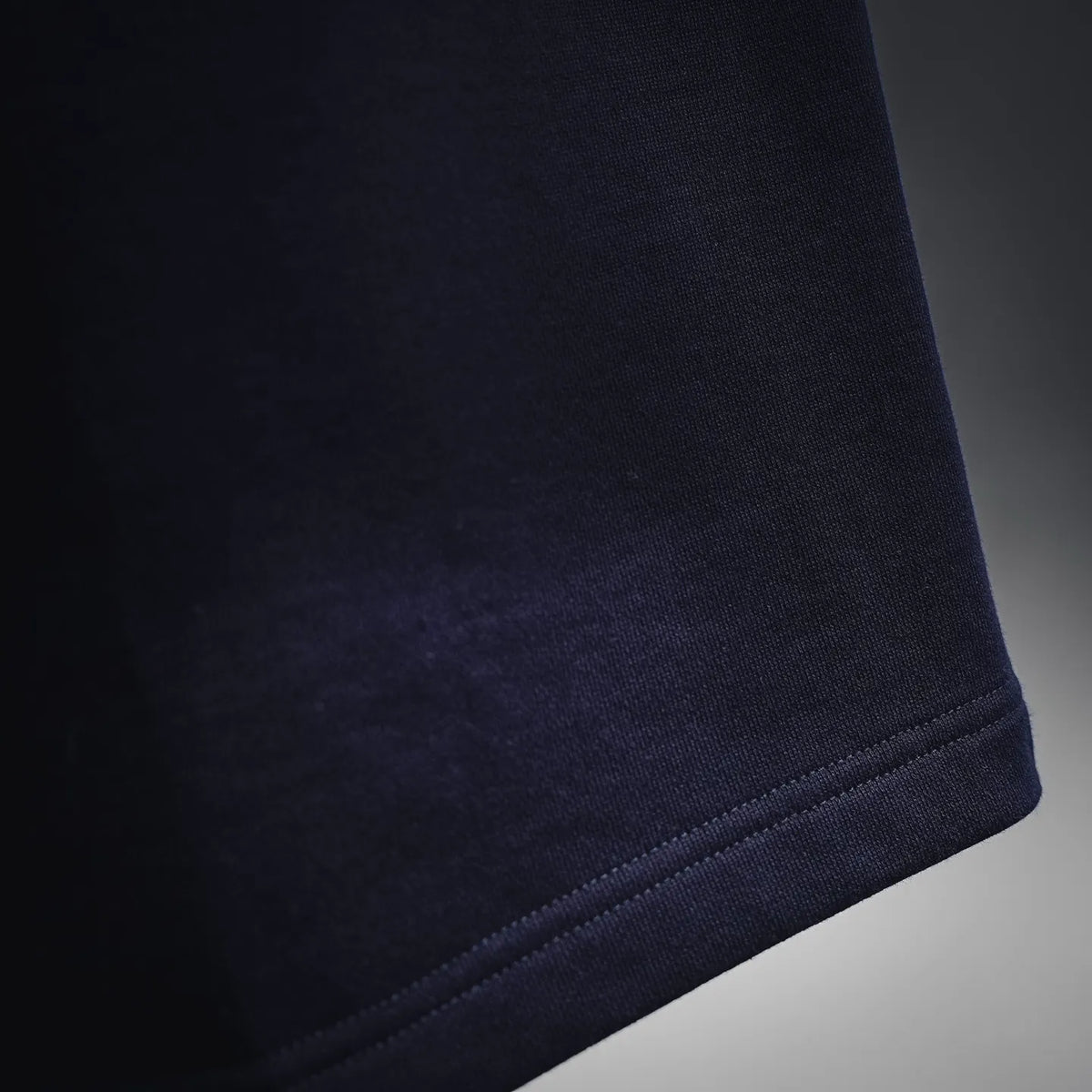 Navy shorts hem with double-stitched finish