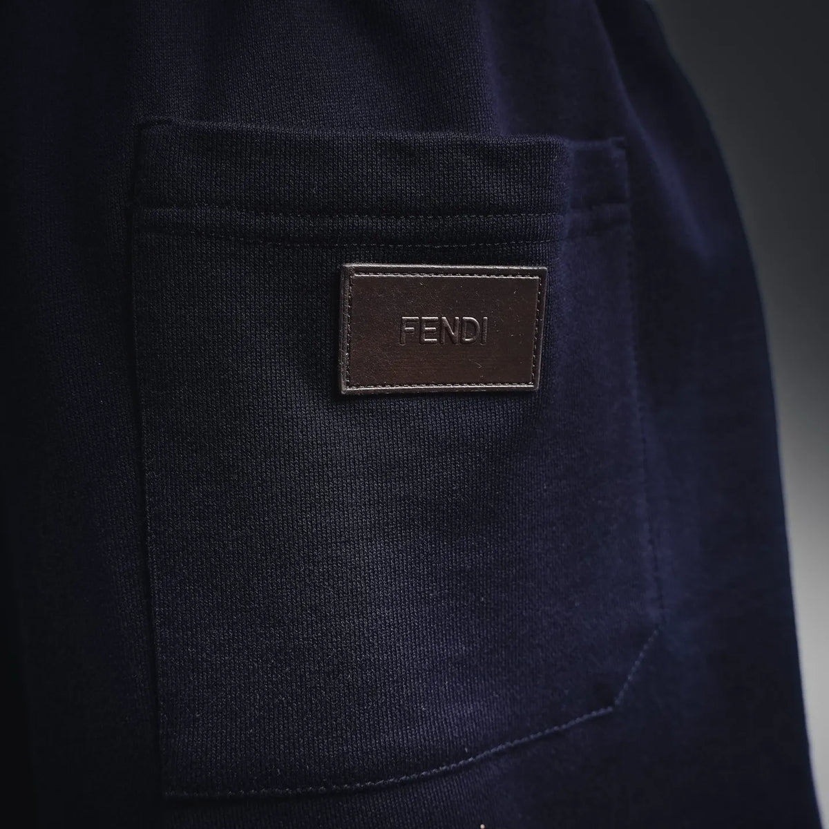 Navy shorts side patch pocket with FENDI leather logo patch